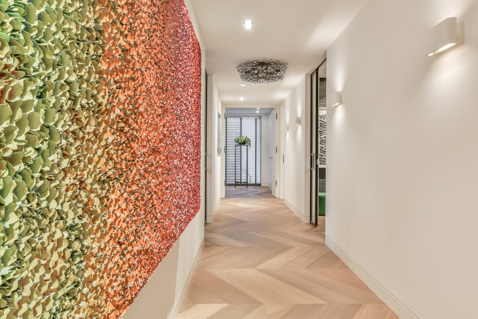 A long empty corridor, designed in luxury style. Beautiful hallway with multicolored walls